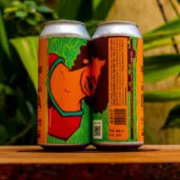 Verso da lata da cerveja Manga IPA da Tarantino, detalhando os ingredientes como polpa de manga, lúpulo, malte de cevada e a data de fabricação.