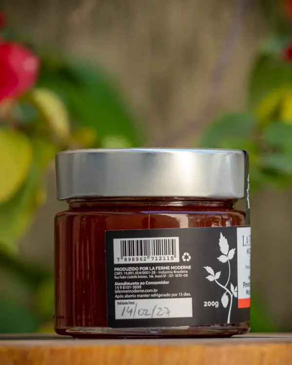 Extrato do rótulo da geleia artesanal detalhando os ingredientes naturais base de mamão e maçã