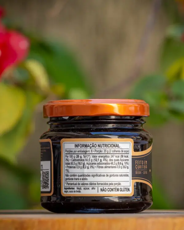 Verso do pote Geleia de Alho Negro Zappa Geleias com tabela nutricional ingredientes naturais e selo sem glúten