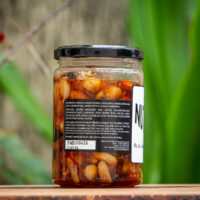 Detalhe do rótulo da geleia Nuts'n Jam Rutz exibindo ingredientes, tabela nutricional e dados do fabricante.